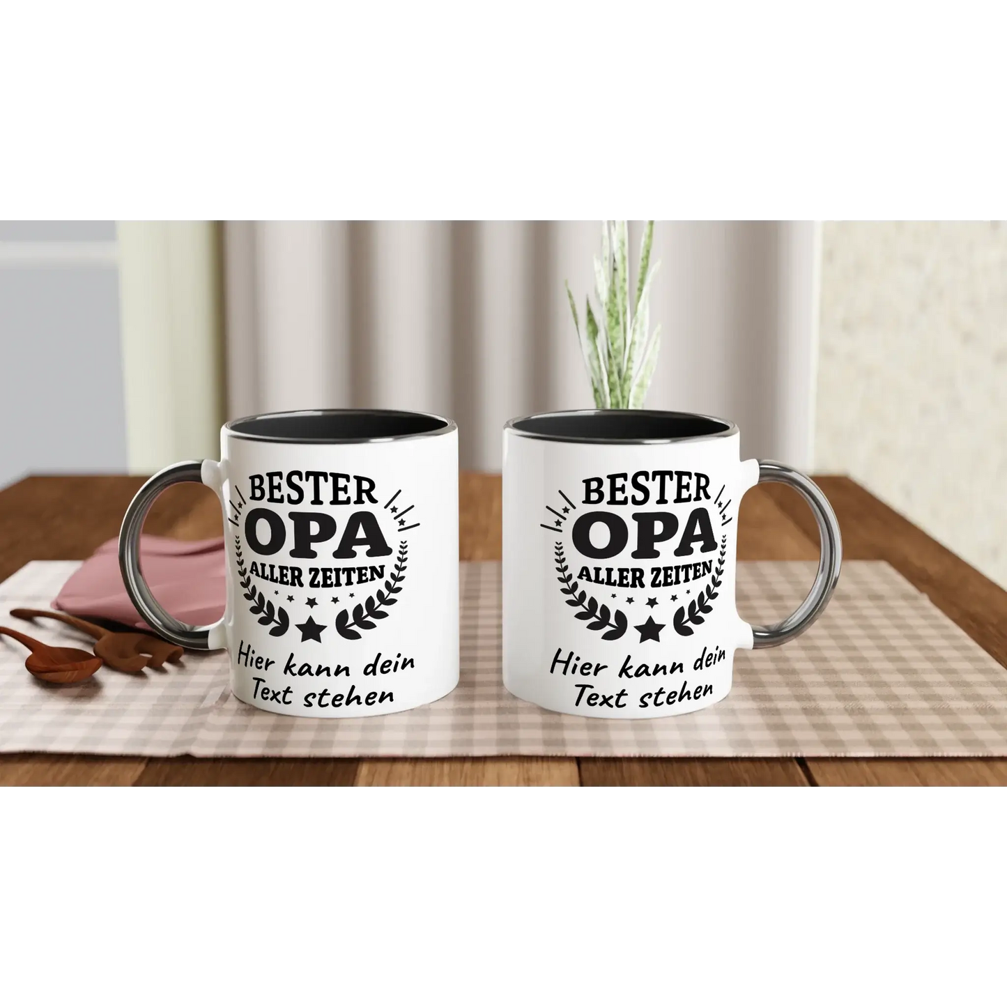 Two white mugs with black interiors and handles rest on a checkered tablecloth. Ideal as a Geschenk, each personalized Tasse by Tasse mit Herz features Bester Opa aller Zeiten and Hier kann dein Text stehen, decorated with branches.