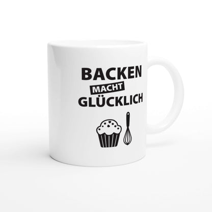 Frontansicht der Tasse mit Muffin- und Schneebesen-Motiv und Spruch "Backen macht glücklich"