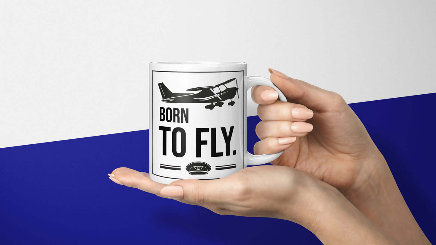 Tasse mit Born to Fly Text